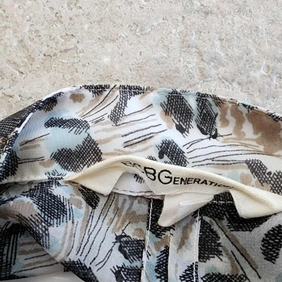 EUC- BCBGeneration - romper . Size S. Black, cream, taupe and light blue pattern - Picture 6 of 8